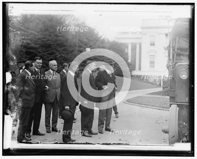 Group outside White House: includes Woodrow Wilson (right), and Newton..., between 1910 and 1920. Creator: Harris & Ewing.