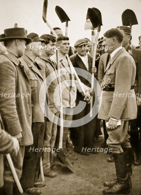 Adolf Hitler chatting to road workers, 1936 Artist: Unknown
