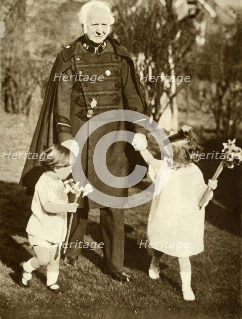 General Bramwell Booth with his two grandchildren, 1929, (1935). Creator: Unknown.