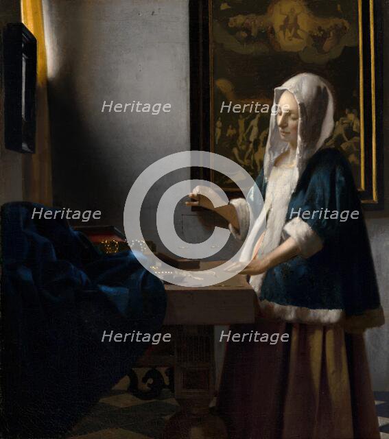 Woman Holding a Balance, c. 1664. Creator: Jan Vermeer.