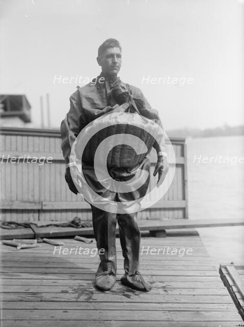 T. Aud in Life Saving Suit, 1916. Creator: Harris & Ewing.