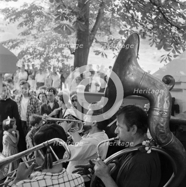 The brass section of a group of musicians, Hampstead Heath, London, c1946-c1959. Artist: John Gay