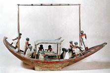 Ancient Egyptian model of a boat carrying a mummy to its tomb. Artist: Unknown