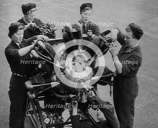 Women Working on an Aeroplane Engine, 1942. Creator: British Pathe Ltd.