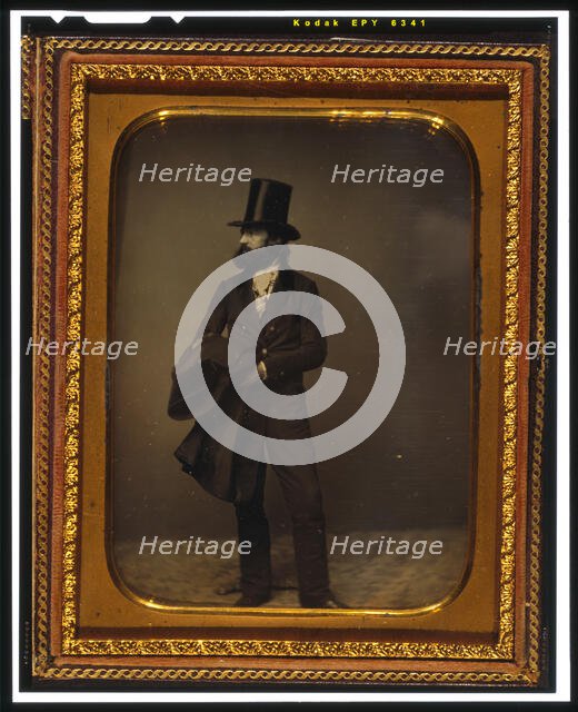 William Sidney Mount, full length portrait, facing left, wearing top hat..., between 1853 and 1860. Creator: Mathew Brady.