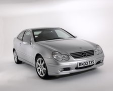 2003 Mercedes Benz C200k Coupe. Artist: Unknown.