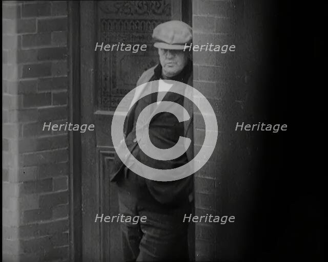 Male Civilians Standing in the Streets, 1926. Creator: British Pathe Ltd.