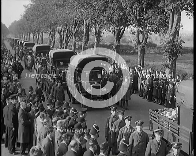 RAF Officers and Male Civilians Taking Part in a Funeral Parade for the Dead Crew of the..., 1930. Creator: British Pathe Ltd.