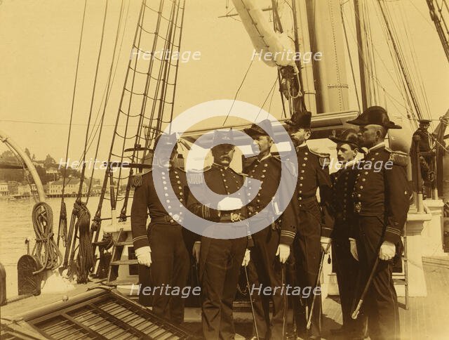 Six naval officers, full-length portrait, standing on deck of ship, 1894 or 1895. Creator: Alfred Lee Broadbent.