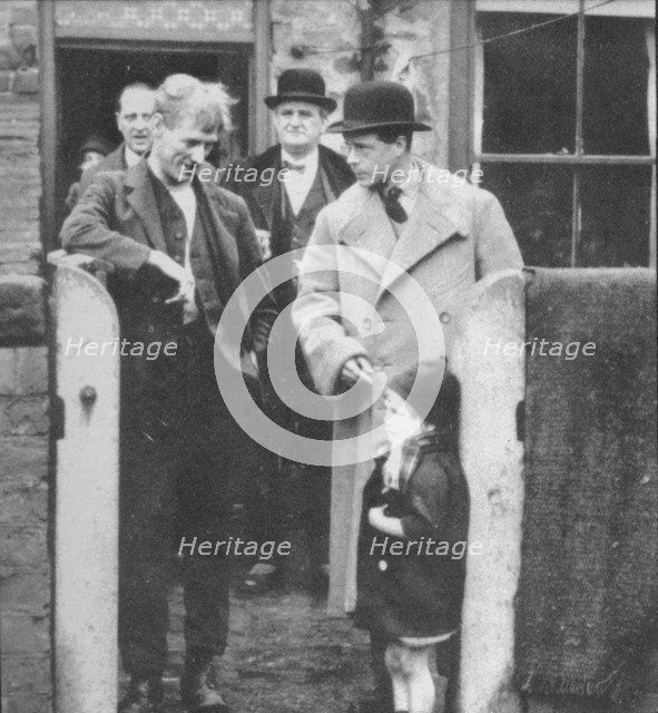 The Prince of Wales visiting a miner's cottage in the Northeast of England, 1929 (1936). Artist: Unknown.