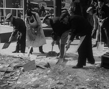 Civilians Clearing up Bomb Damage, 1940. Creator: British Pathe Ltd.