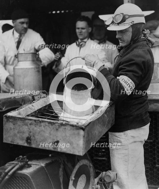 Frank Clement refuelling Bentley at Brookland Double 12 race 1930. Creator: Unknown.