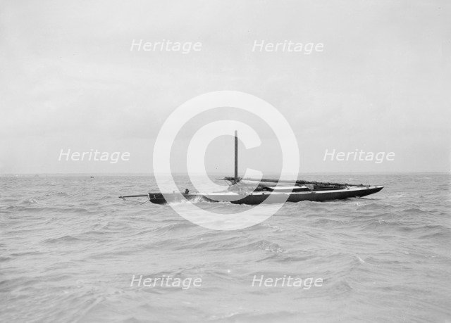 The dismasted sailing yacht 'Doris', 1912. Creator: Kirk & Sons of Cowes.