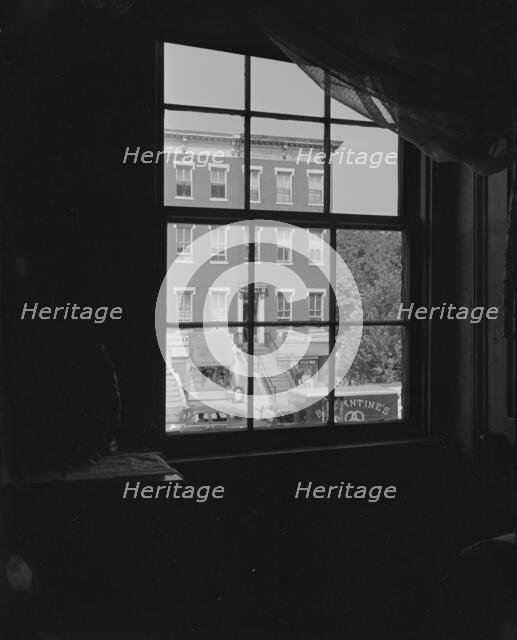 View from the bedroom window of Mrs. Ella Watson, a government worker, Washington, D.C., 1942. Creator: Gordon Parks.