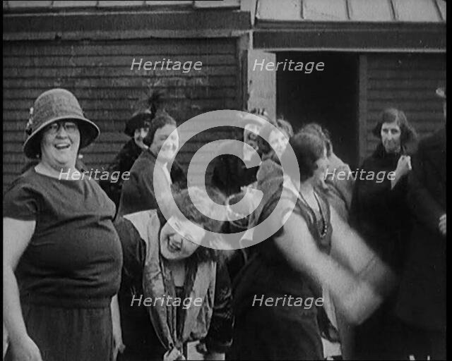 A Group of Plus Size Female Civilians Exercising on a Beach, 1920. Creator: British Pathe Ltd.