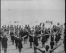 A Group of Female Civilians Exercising on a Beach, 1920. Creator: British Pathe Ltd.