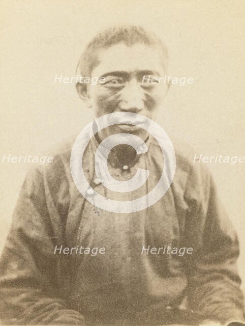 Half-length portrait of man, seated, facing front, between 1870 and 1886. Creator: Unknown.