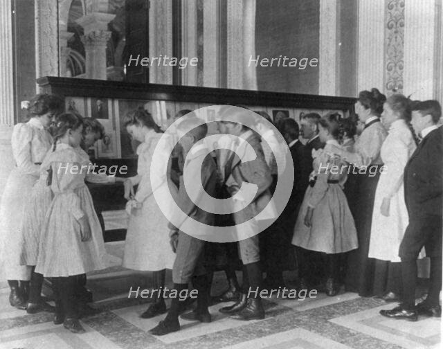 Washington, D.C. public schools - museum field trip - viewing exhibit case of George Wa..., (1899?). Creator: Frances Benjamin Johnston.