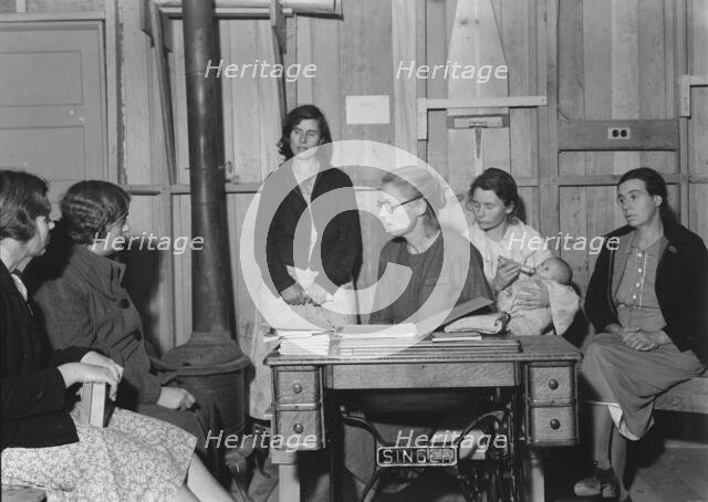 Meeting of the Mothers' Club in Arvin camp for migrant workers, Kern County, 1938. Creator: Dorothea Lange.