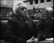 Male Representative of the League of Nations Listening to Speeches, 1937. Creator: British Pathe Ltd.