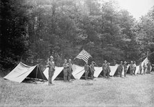 Boy Scouts Standing In Front of Tents In Encampment, between 1914 and 1917. Creator: Harris & Ewing.