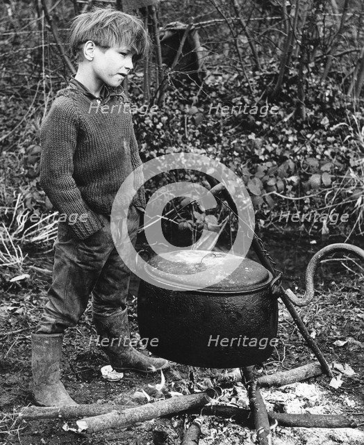 Gypsy boy with cauldron, 1960s.