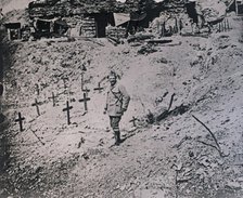 Soldier among wooden crosses, c1914-c1918. Artist: Unknown.