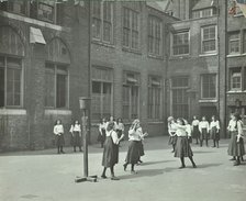 Girls playing netball in the playground, William Street Girls School, London, 1908. Artist: Unknown.