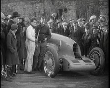 Malcolm Campbell Preparing his Car 'Bluebird' Watched By a Crowd of Civilians, 1927. Creator: British Pathe Ltd.