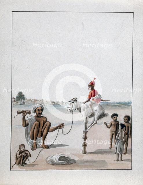 A man conducting a monkey show on the street, watched by some children, (between 1800 and 1899?). Creator: Unknown.