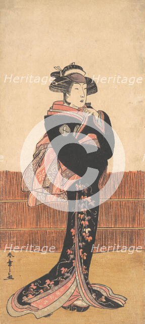 The Third Azuma Tozo as a Woman in a Black Kimono, probably 1782. Creator: Shunsho.