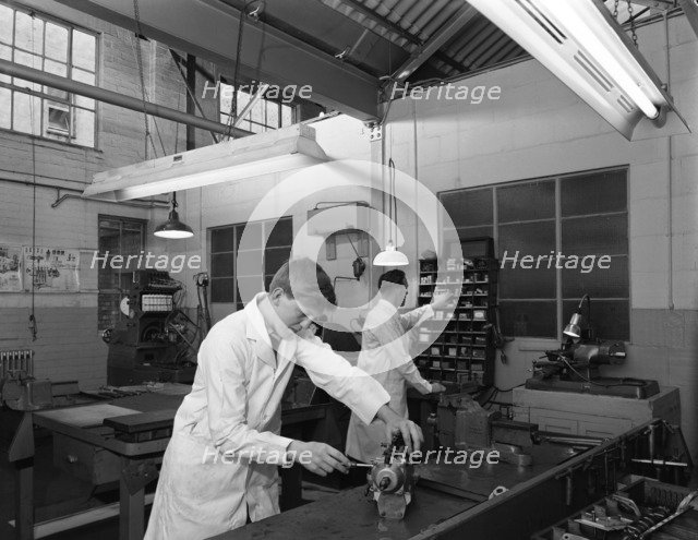 Apprentice at work, Globe & Simpson auto electrical workshop, Nottingham, Nottinghamshire, 1961. Artist: Michael Walters