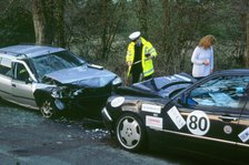 Head on Collision on country road. Artist: Unknown.