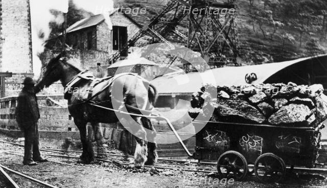 A pithead scene, postcard, 1910. Creator: Unknown.
