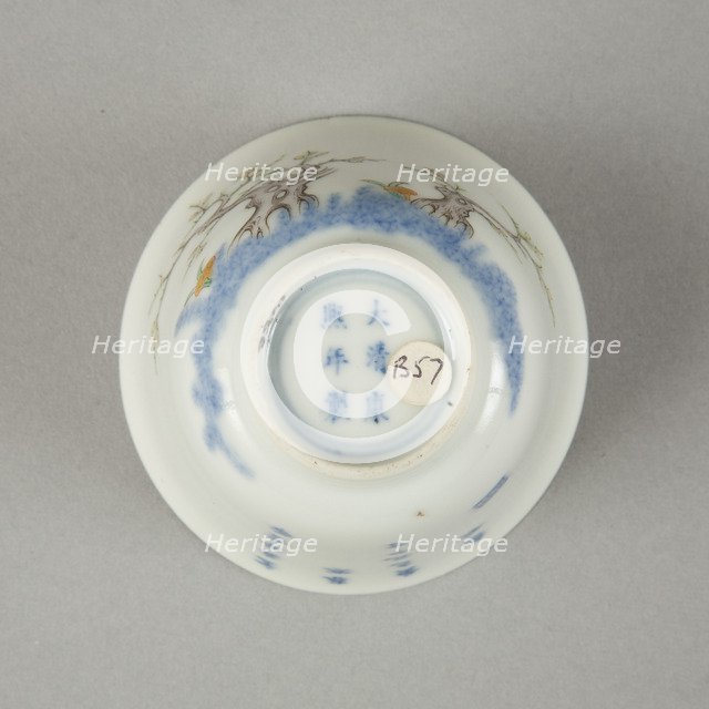 Underglaze blue month cup with polychrome enamelled decoration of a prunus tree. Artist: Unknown.