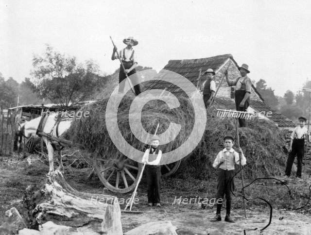 Men and boys with tools and a haycart, c1860-c1922. Artist: Henry Taunt