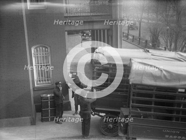 Belongings of Count J.H. Von Bernstorff being removed from the German Embassy, Washington DC, 1917.  Creator: Harris & Ewing.