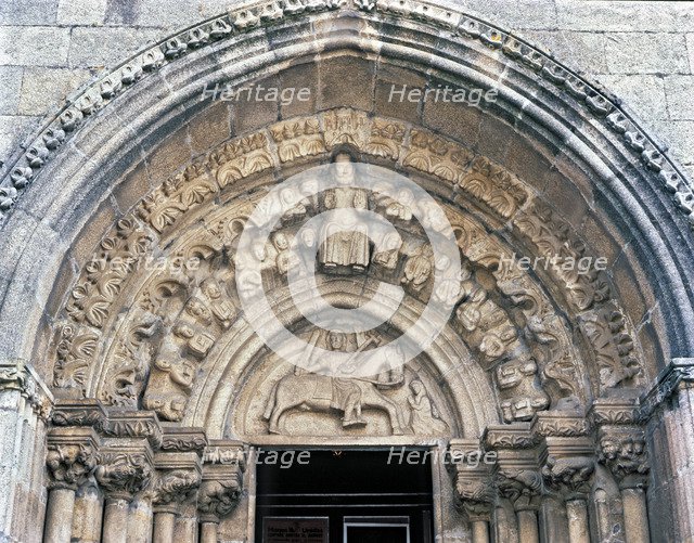 Church of Santiago, detail of the front door with sculpture of Santiago on horseback and Jesus Ch…