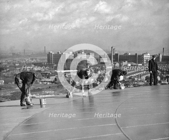 Workmen painting the top of Radford Gasometer, Nottingham, Nottinghamshire, c1949. Artist: Edgar Lloyd