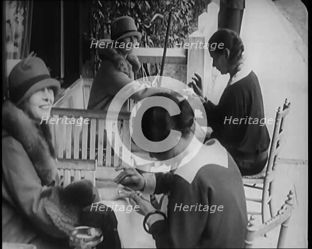 Female Civilians Having Their Nails Manicured, 1926. Creator: British Pathe Ltd.