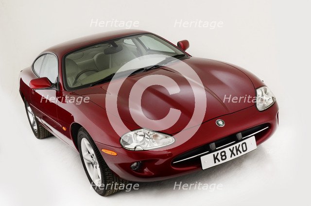 1999 Jaguar XK8 coupe Artist: Unknown.