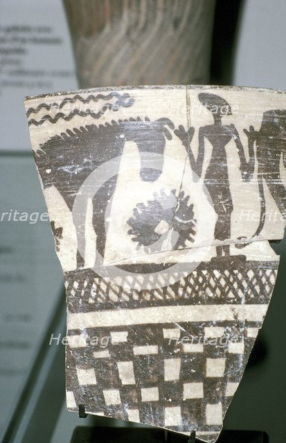 Terracotta pottery fragment of a human figure between two horses, Tepe Sialk, Iran, 4th mil. BC. Artist: Unknown