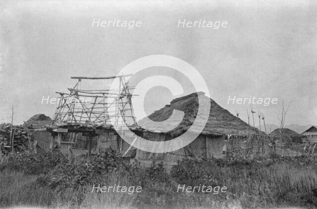View of Ainu village, 1908. Creator: Arnold Genthe.