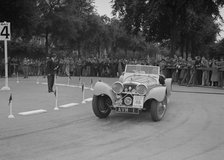 Jaguar SS 100 of Mrs V Hetherington competing in the South Wales Auto Club Welsh Rally, 1937 Artist: Bill Brunell.