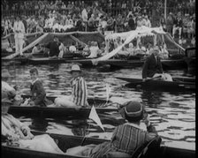 Groups of People Picnicking in Punts at Boulter's Lock, Maidenhead, 1926. Creator: British Pathe Ltd.