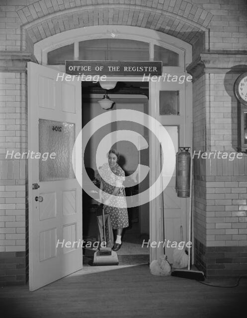 Charwoman cleaning after regular working hours..., Washington, D.C., 1942. Creator: Gordon Parks.