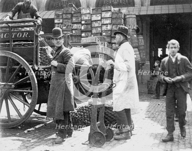 Unloading at Billingsgate Market, London, 1893. Artist: Paul Martin