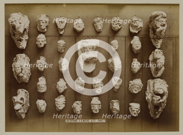 Casts of Gothic heads, possibly from York stalls, 1876. Creator: Bedford Lemere and Company.