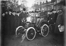 Louis Renault in the driver's seat of a Voiturette Renault 1¾ hp, 1899. Artist: Unknown