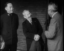 A Group of Four Male Japanese Politicians Talking Animatedly, 1937. Creator: British Pathe Ltd.